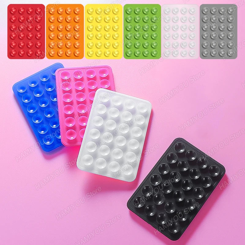 Sticktok: Reusable Suction Holder for Mobile Devices